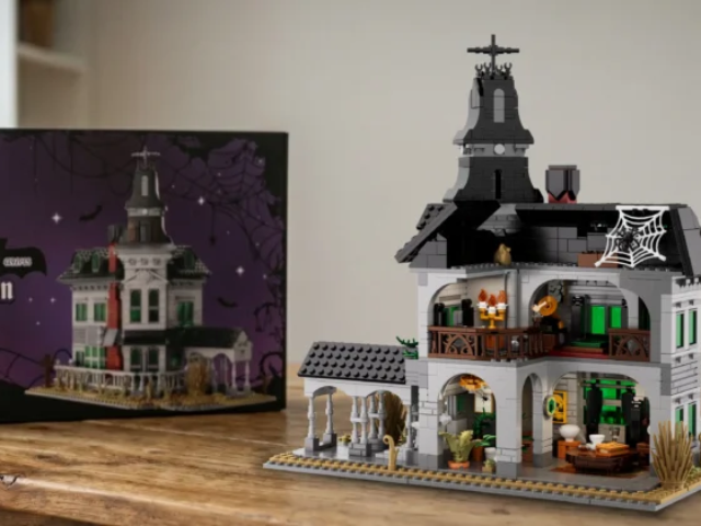 Haunted manor entrance with covered Victorian porch