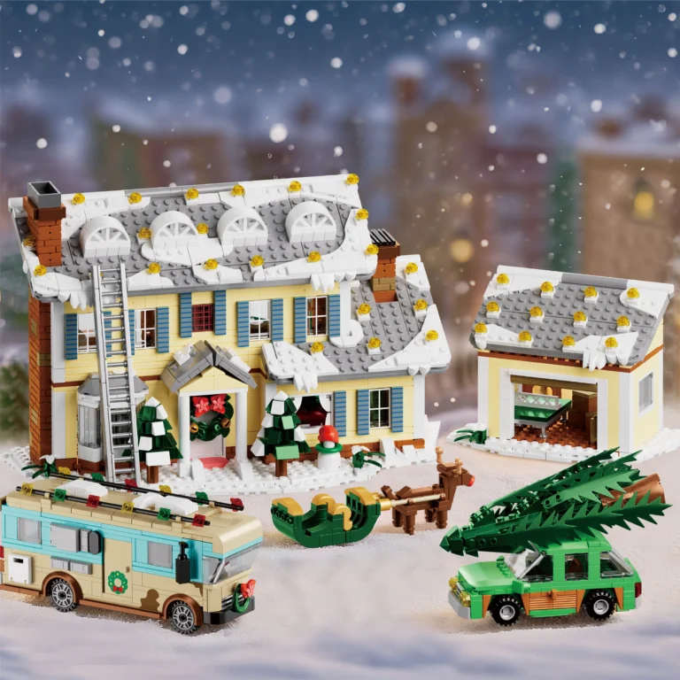 Snow-covered roof with holiday lights on the Christmas house model